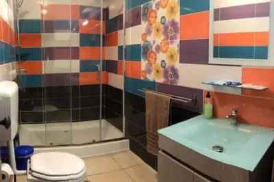 a bathroom with a shower and a toilet and a sink at ALEXA APARTMENT T2, Albufeira Center two bedrooms Self check-in in Albufeira