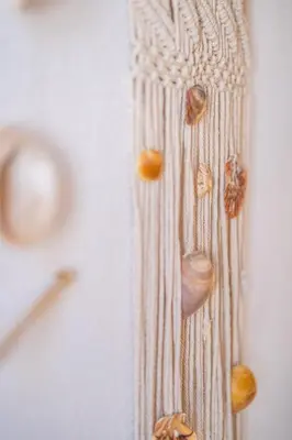 a bunch of seashells hanging on a wall at Beach Studio in Albufeira's old town in Albufeira