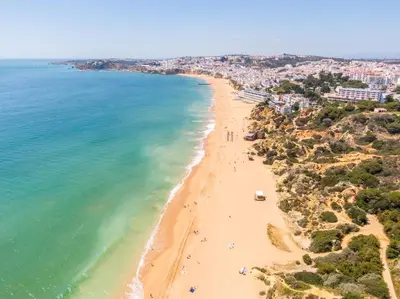 an aerial view of a beach in positano at Entire Apartment 5min from Oura Beach in Albufeira