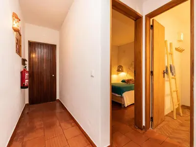 a hallway with a room with a bed at Akisol Albufeira Euphoria in Albufeira