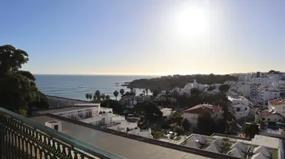 an aerial view of a city and the ocean at Bicos Beach Apartments By Albufeira Rental in Albufeira