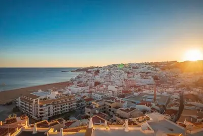 an aerial view of a town on the beach at Albufeira Old Town Center - VERASOL 1 in Albufeira