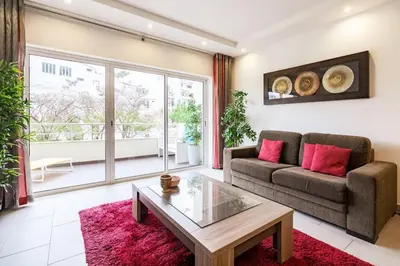 a living room with a couch and a coffee table at Albufeira, OLD TOWN - VERASOL N in Albufeira