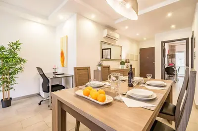 a dining room with a table with oranges on it at Albufeira, OLD TOWN - VERASOL N in Albufeira