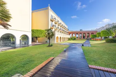 a walkway in front of a building at Vilamoura Marina Lake in Vilamoura