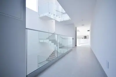a white hallway with glass shelves and a staircase at Blue Horizons, (AT18) 2 Bedroom, Olhos de Agua in Olhos de Água