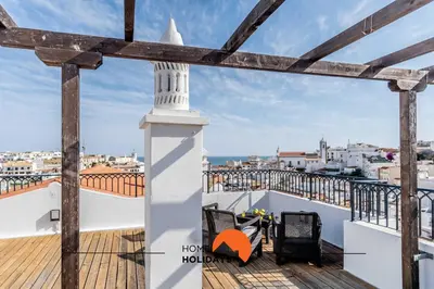 a balcony with a view of the city at #164 Saradel 42 by Home Holidays in Albufeira