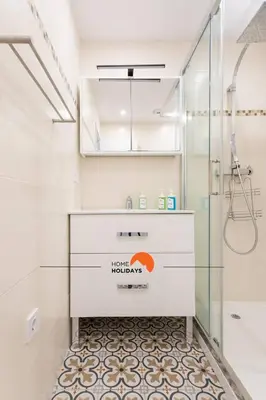 a bathroom with a sink and a shower at #165 Liberdade 105 by Home Holidays in Albufeira