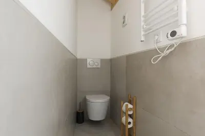 a small bathroom with a toilet in a room at Madalena Village 1 - City centre by HD PROPERTIES in Faro