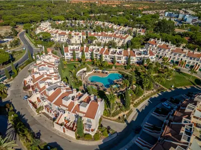 an aerial view of a resort at 5 star Luxury Palmview apartment with large terrace and communal pool in Quarteira