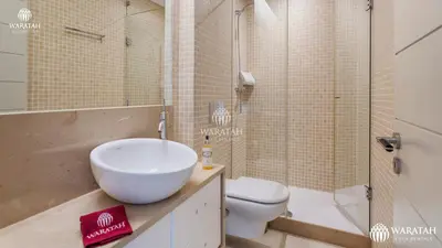 a bathroom with a sink and a toilet and a shower at Apartment Micaela in Vale do Lobo