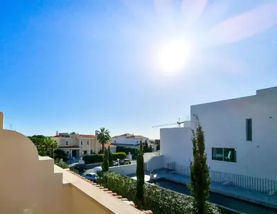 a view from the balcony of a white building at FLH Quinta das Salinas Triplex with Balcony in Vale do Lobo