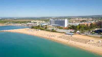 an aerial view of a beach and the ocean at Vilamoura Garden View 2 With Pool by Homing in Vilamoura