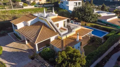 an aerial view of a house with a pool at Villa Andrea by Gabi Miguel in Albufeira