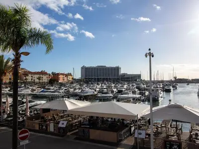 a marina filled with lots of boats in the water at Vilamoura Marina Apartment by Stay ici Algarve Holiday Rental in Quarteira