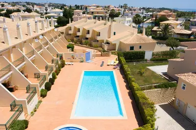 an aerial view of a swimming pool in a villa at Rosal Beach House in Albufeira