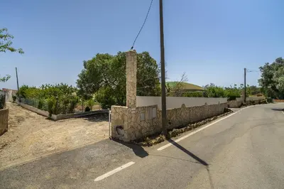 a pole on the side of a road at Casa Solar in Guia