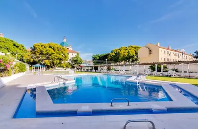 a kitchen with a view of the ocean at AL - Apartamento Algardia Mar in Vilamoura