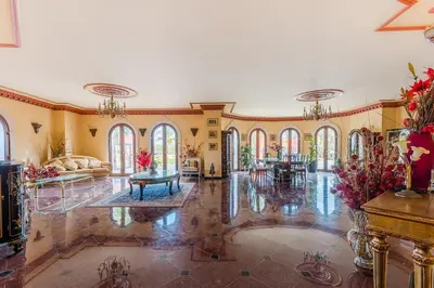 a large room with a living room with a couch at Quinta do Galvao - Luxury Villa by HD PROPERTIES in Quarteira