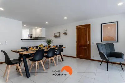 a dining room with a table and chairs at #169 T3 Medronheira by Home Holidays in Albufeira