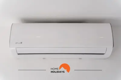 a white router with a home tutorials sticker on it at #169 T3 Medronheira by Home Holidays in Albufeira