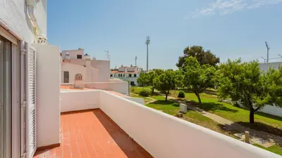 a view from the balcony of a house at 2 BDR Vilamoura Escape W Balcony by LovelyStay in Quarteira