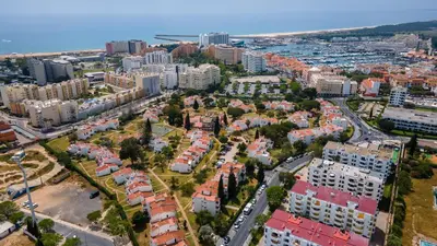 an aerial view of a city with buildings at 2 BDR Vilamoura Escape W Balcony by LovelyStay in Quarteira