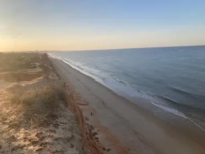 an aerial view of a beach next to the ocean at Praia Village AG in Vilamoura