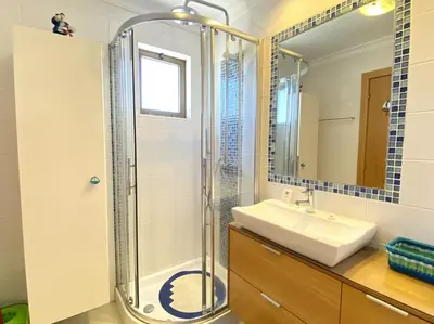 a bathroom with a shower and a sink at Vilamoura Central 7 With Pool by Homing in Vilamoura
