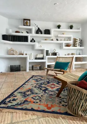 a living room with a couch and a rug at Casa di Campara Villa Faro in Faro