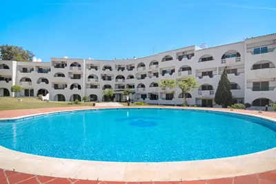 a large swimming pool in front of a building at Sunlight Albufeira by Sunnyway in Albufeira