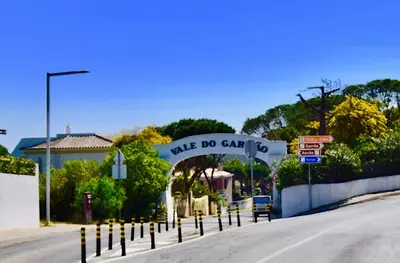 a street sign that reads mile do cant go at Seaside SunFlower in Quinta do Lago