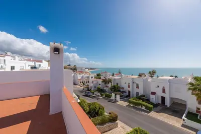 a view of a city from the balcony of a building at Villa Lili in Albufeira