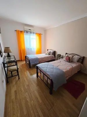 a bedroom with a bed and a painting on the wall at SEAVIEW ALBUFEIRA in Albufeira