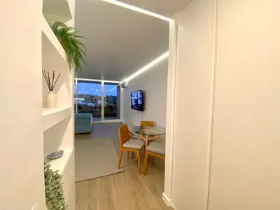 a room with a table and a dining room at Marina Walk Apartment in Vilamoura