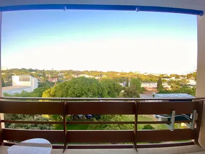 a balcony with a view of a city at Marina Walk Apartment in Vilamoura
