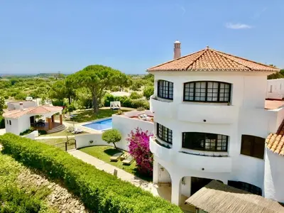 a large white house with a swimming pool at SOLAR DO MONTE 4 in Albufeira