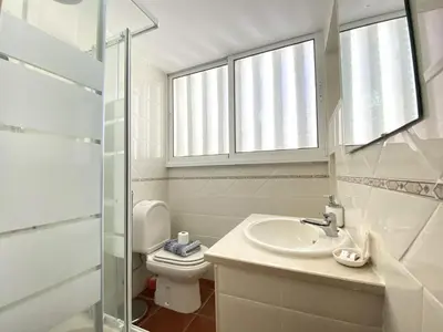 two beds in a room with towels on them at Albufeira Quinta da Balaia Garden by Homing in Albufeira