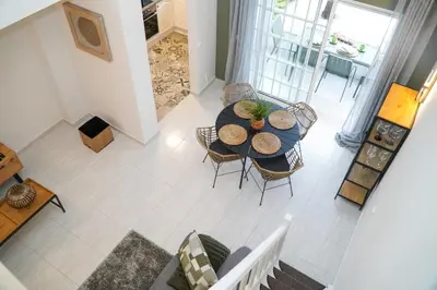 an overhead view of a dining room with a table and chairs at Martina Apartment - SeaView in Albufeira