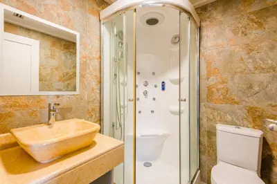 a bathroom with a sink and a shower at Falesia Beach C in Albufeira