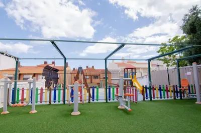 a playground with a bunch of play equipment at Apartamento Turistico Silva in Albufeira
