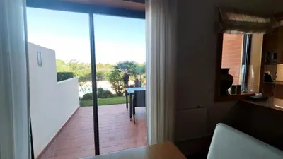 a room with a sliding glass door to a patio at Albufeira Oasis Retreat in Albufeira