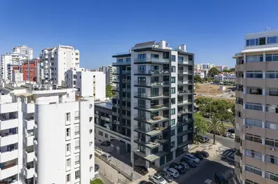 an aerial view of a city with tall buildings at Terracos de Quarteira II Yellow by Real Properties in Quarteira