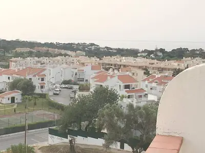 a view of a town with houses and a street at CASA Vila Magna T0 in Albufeira