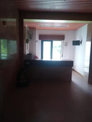 an empty room with a door and a window at Melaya Private Rooms in Faro