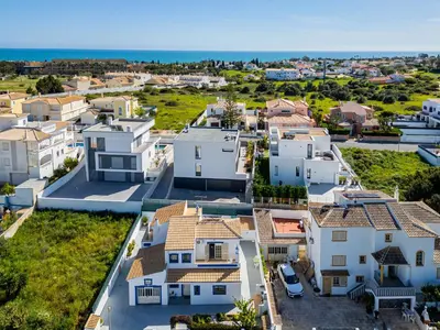 an aerial view of a residential neighborhood with houses at Villa Nina in Albufeira