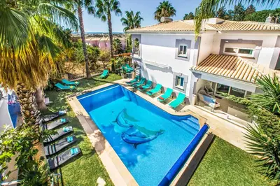 an aerial view of a house with a swimming pool at Villa Paris in Terras Novas