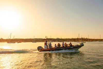a group of people on a boat in the water at Apartment Ipanema 1 by Algarve Vacation in Albufeira