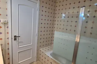 a bathroom with a shower with a tub and a toilet at 403 - Oura - 2 bedroom- Sea View in Albufeira