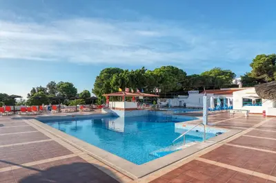 a view of the pool at a resort at BnB Homes Jardim Cozy Apartment with 3 Swimming pools near the Old Town in Albufeira
